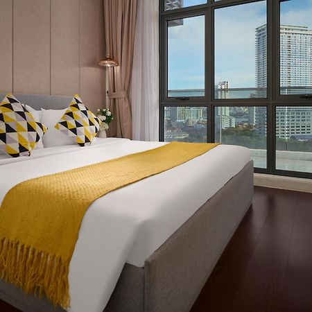 The Peninsula Phnom Penh Hotel Exterior photo